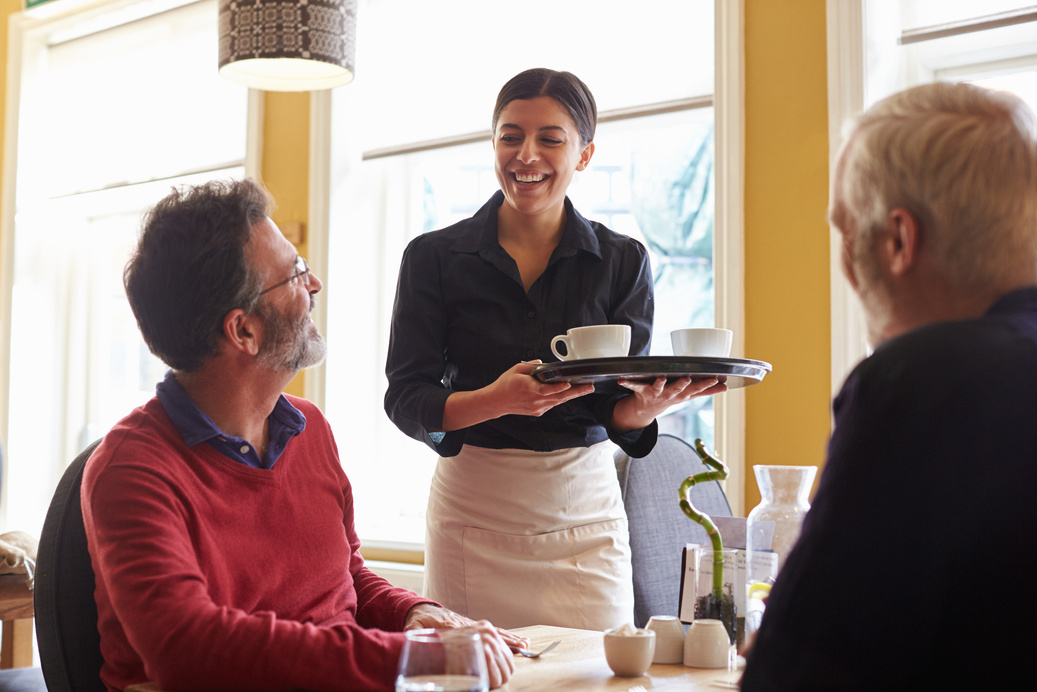 Male Couple Ordering Coffee at a Restaurant 